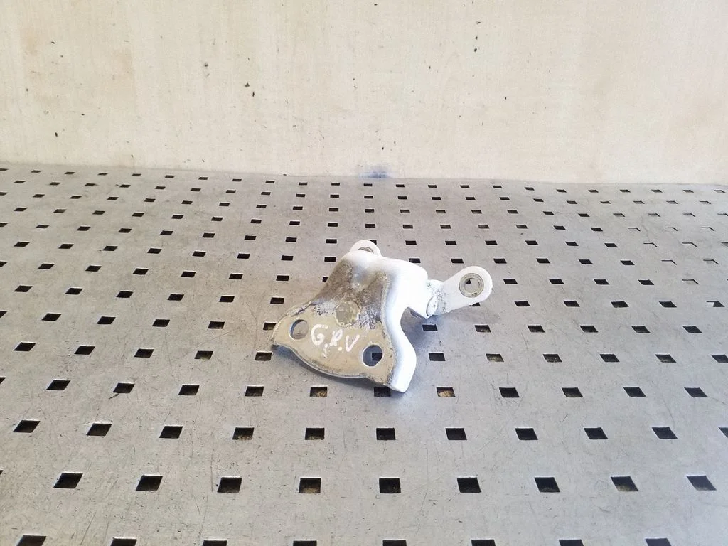 Rear door upper hinge – right