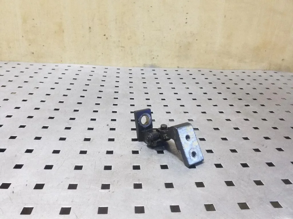 Rear door upper hinge – right
