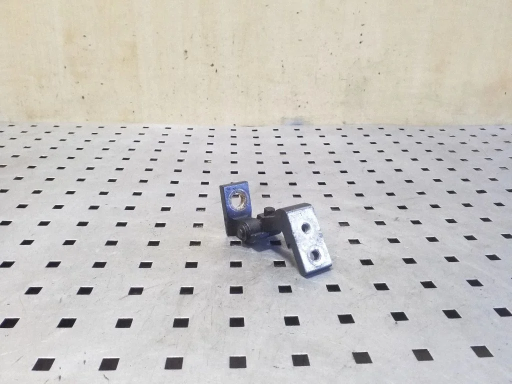 Rear door upper hinge – right
