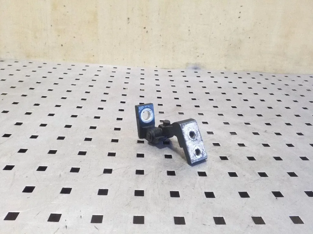 Rear door upper hinge – right