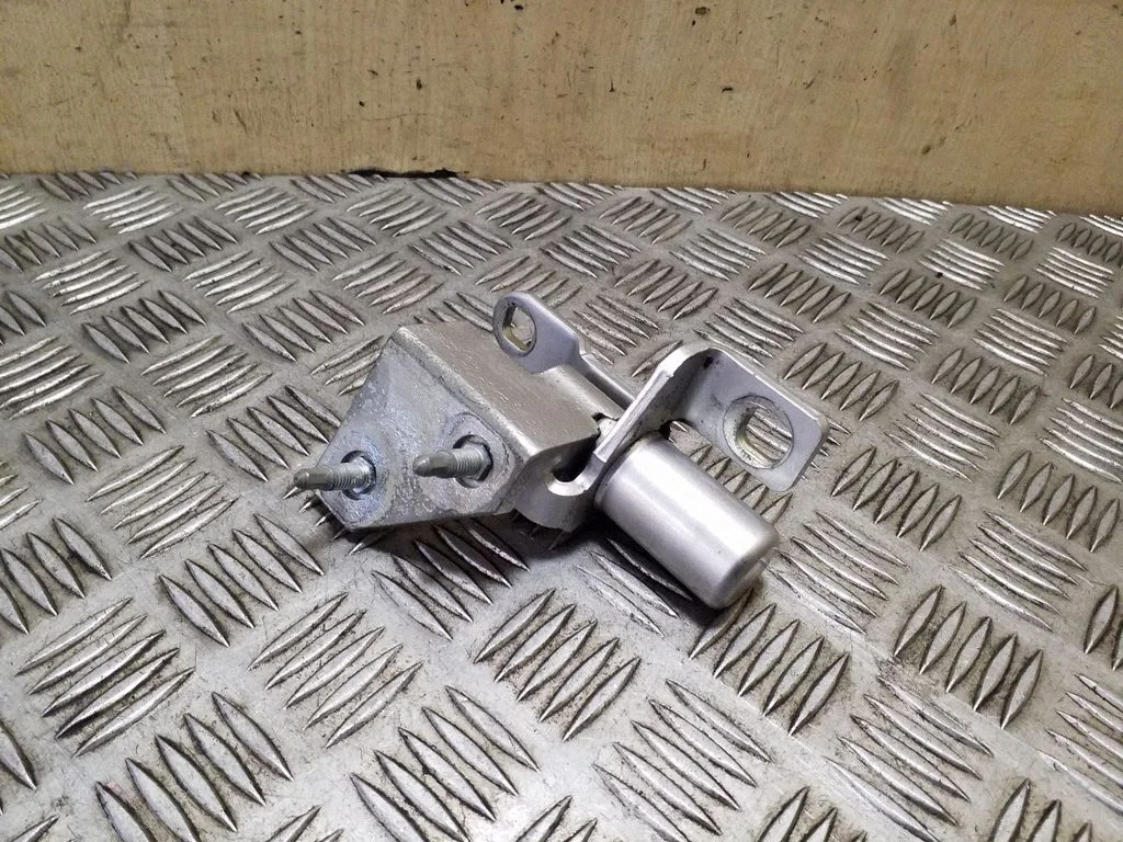 Rear door upper hinge 7S7AA26805AE