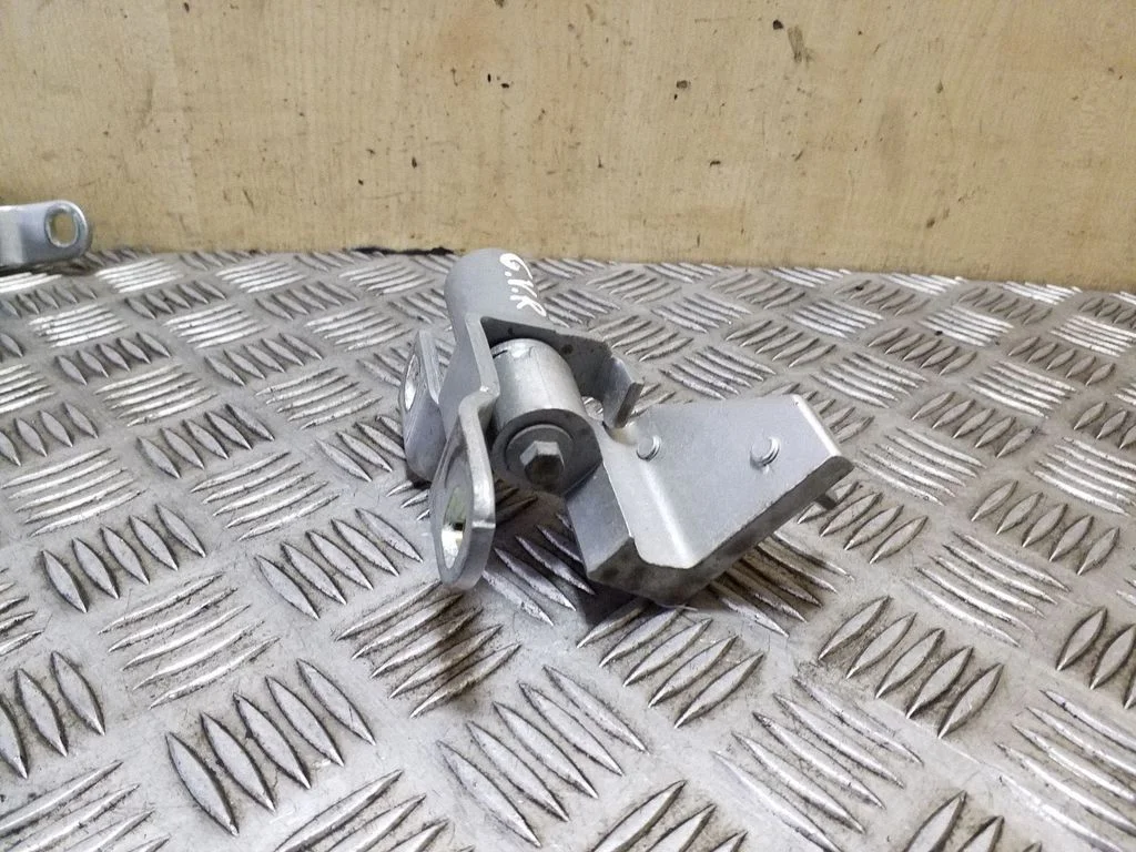 Rear door upper hinge 7S7AA26804AE