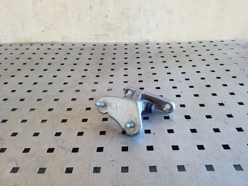 Rear door upper hinge – right