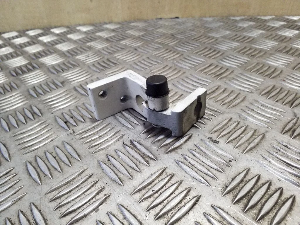 Rear door upper hinge – right
