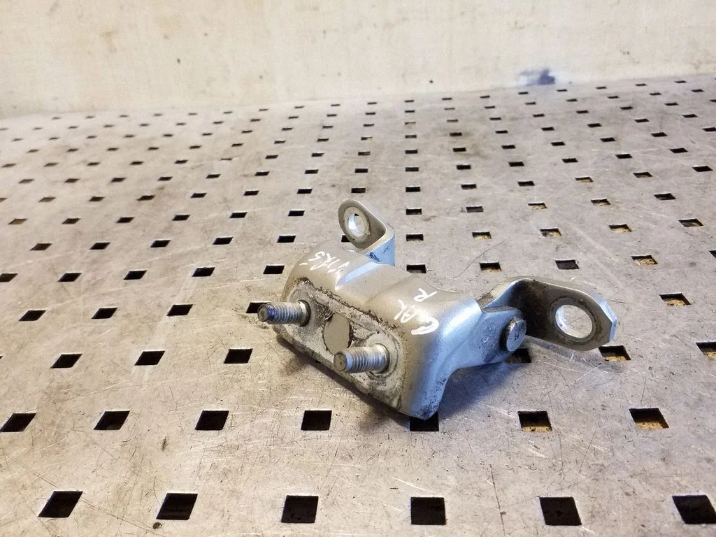 Rear door upper hinge – right