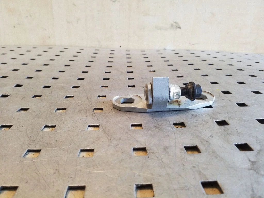 Rear door upper hinge – rear right