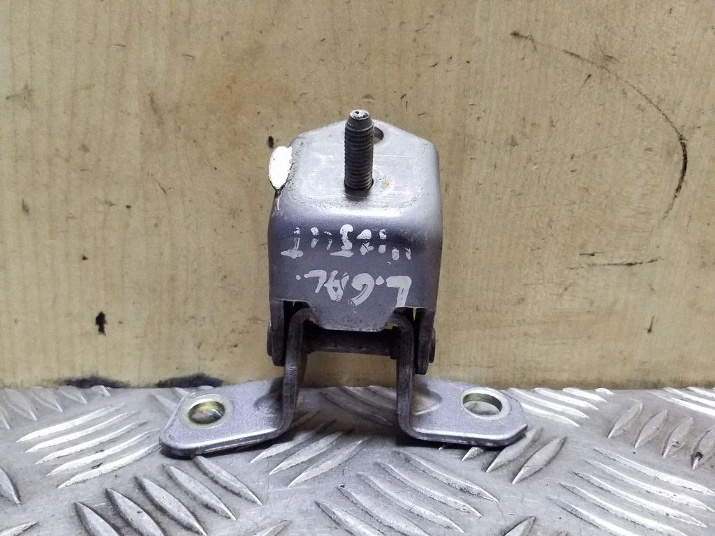 Rear door upper hinge – left