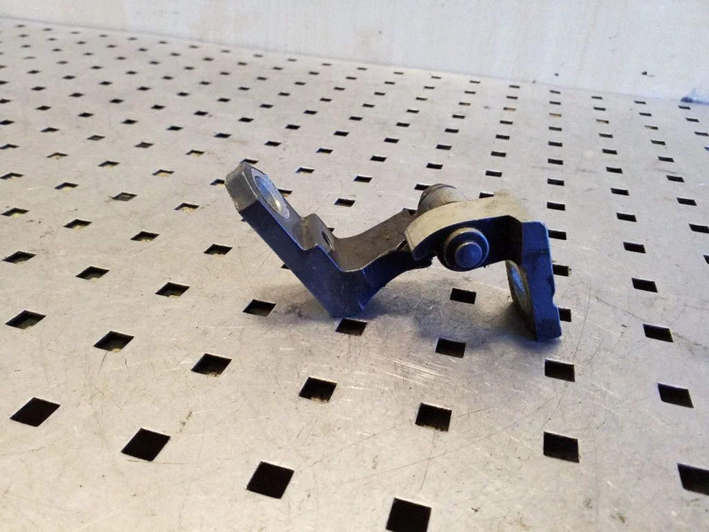 Rear door upper hinge – right