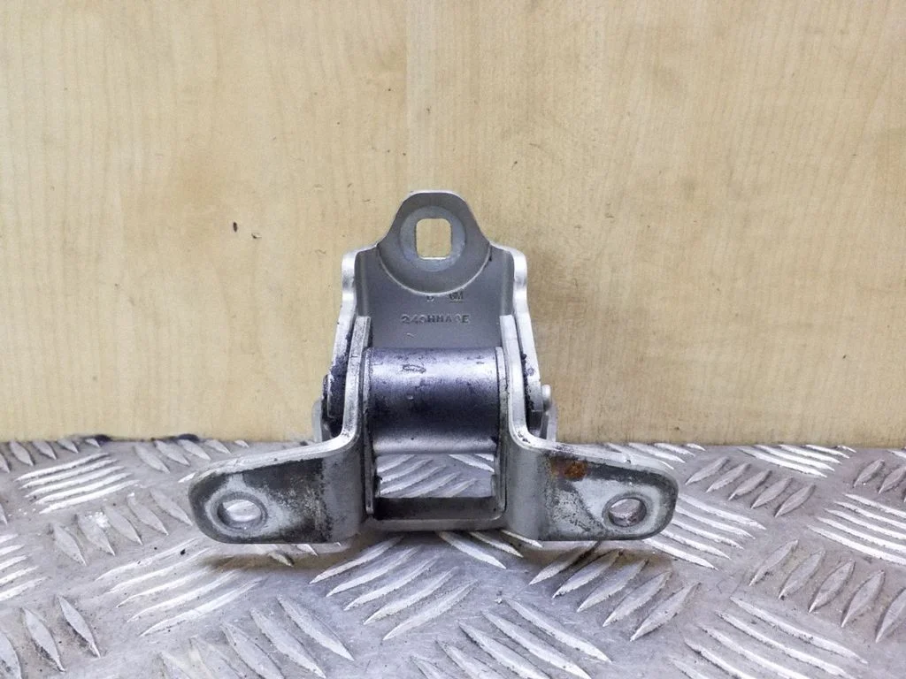 Rear door upper hinge – right