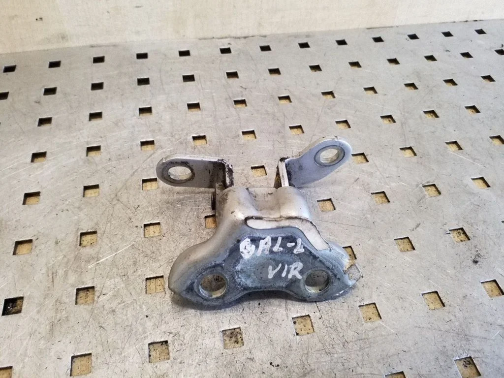 Rear door upper hinge – left