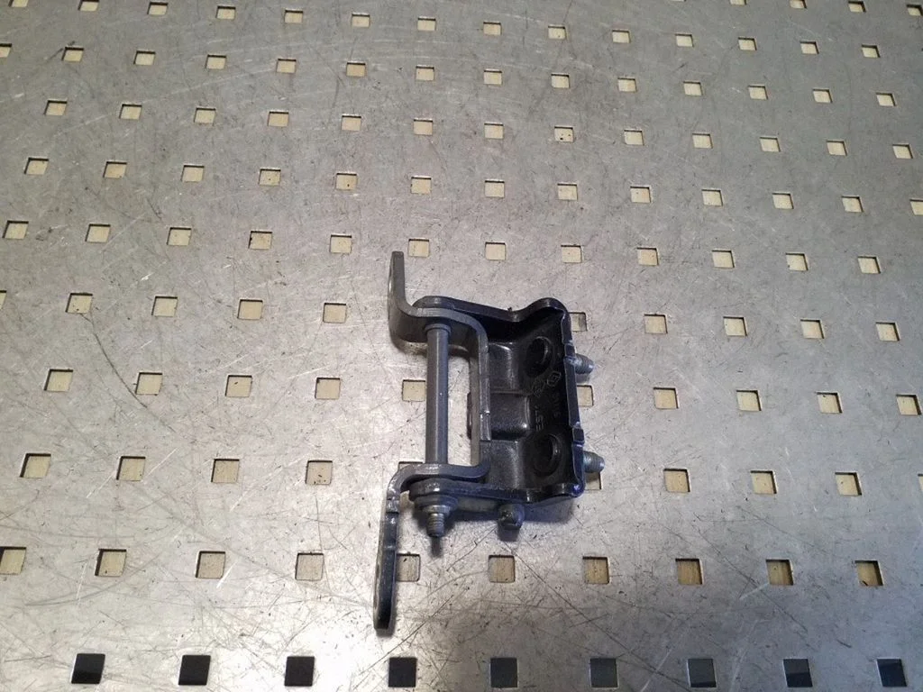 Rear door upper hinge – right