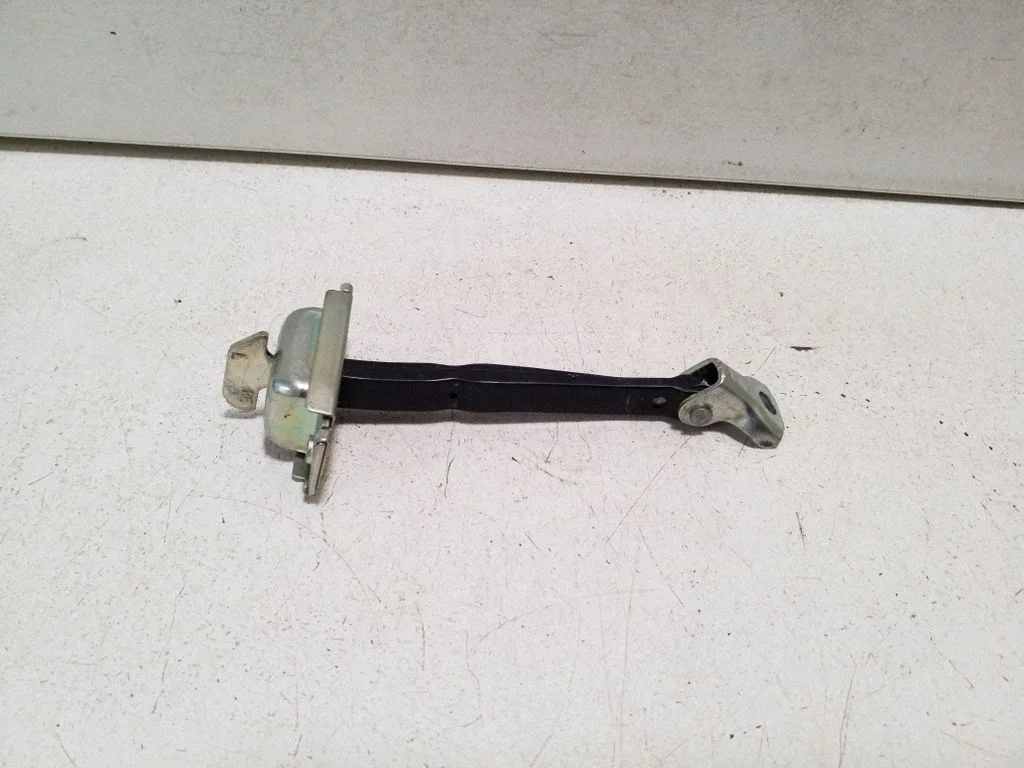 Rear door check strap stopper – right