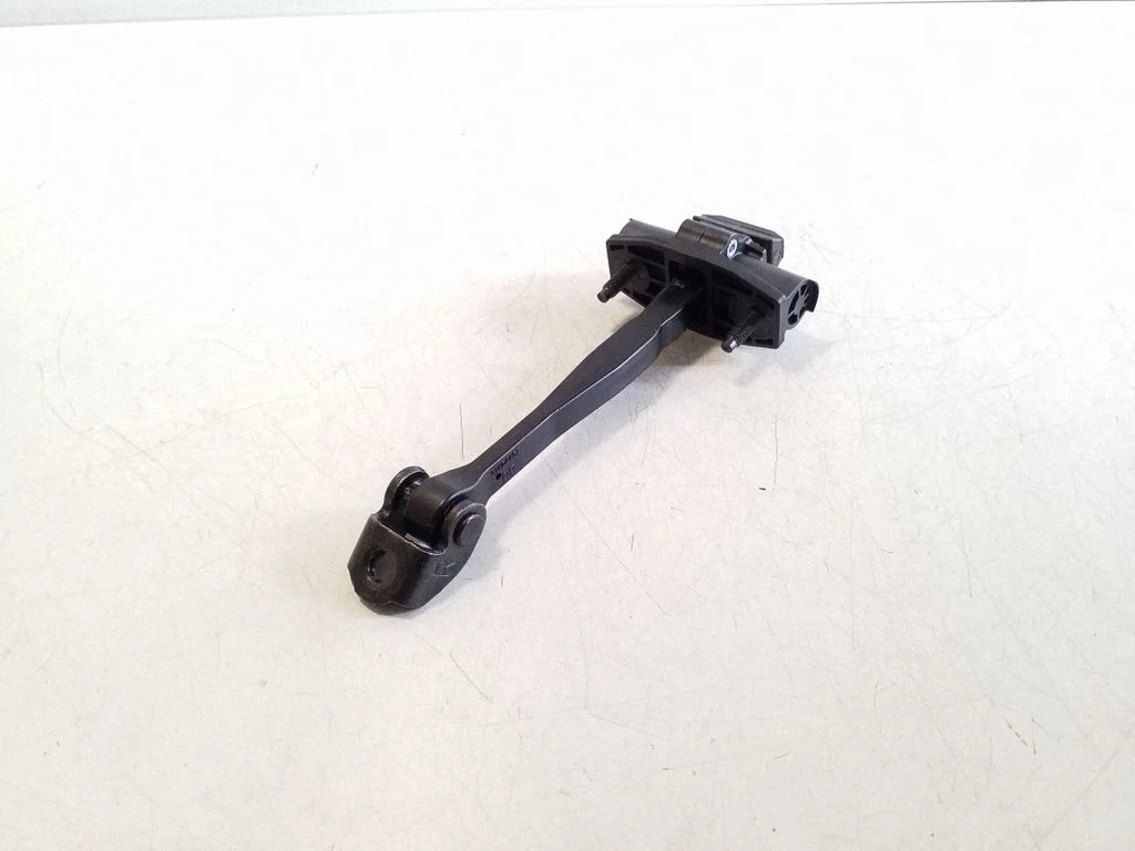 Rear door check strap stopper 31424467