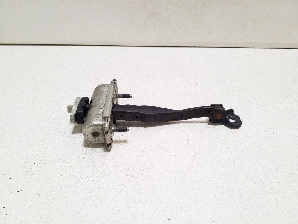 Rear door check strap stopper – right