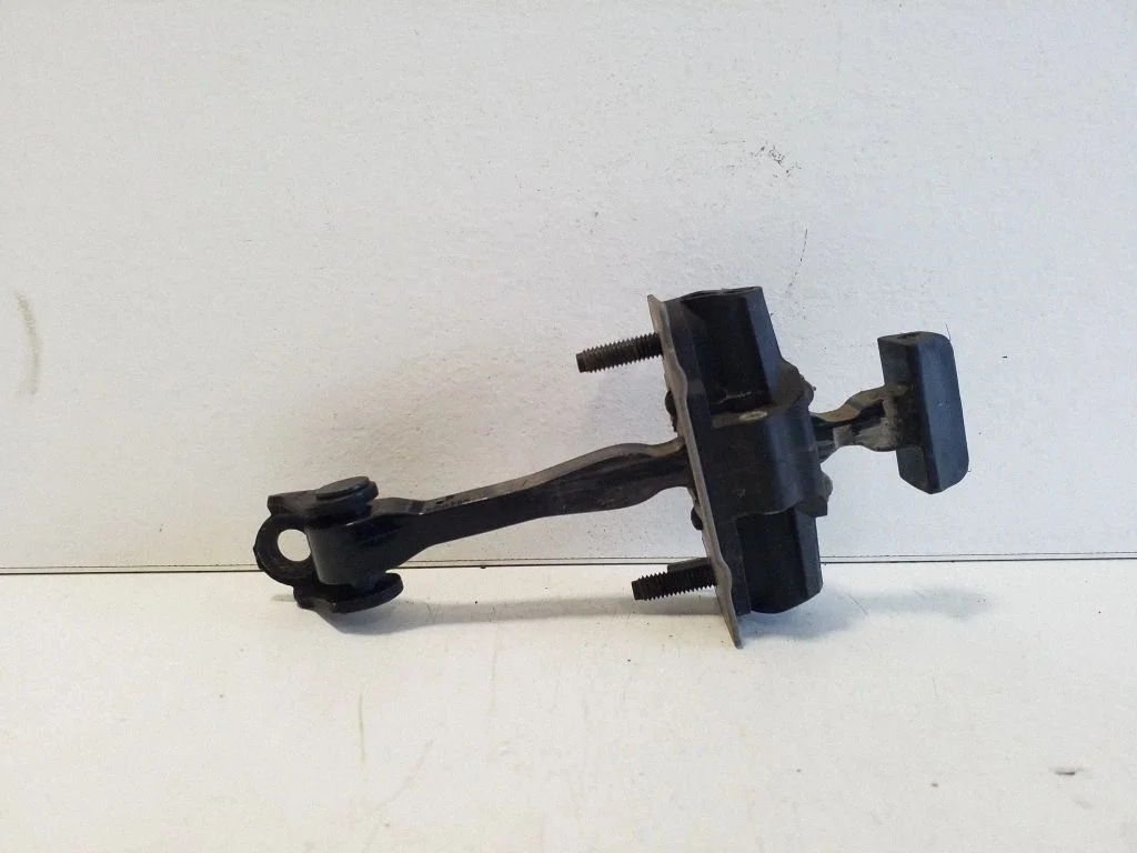 Rear door check strap stopper – right