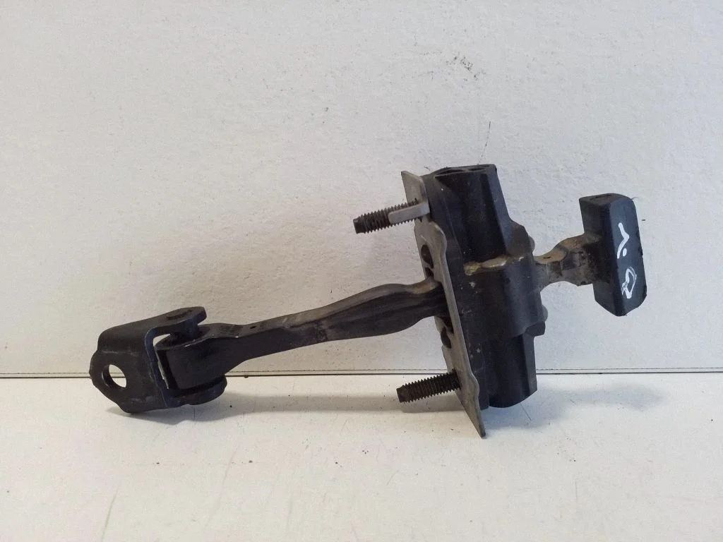 Rear door check strap stopper – left