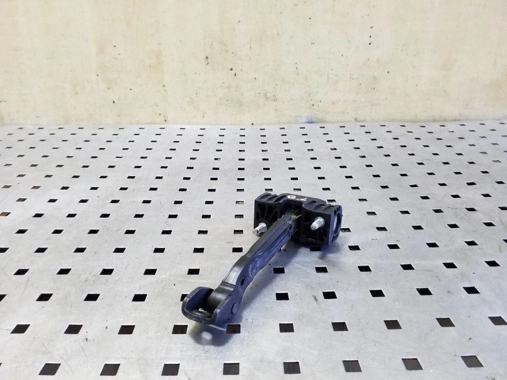 Rear door check strap stopper 31298467