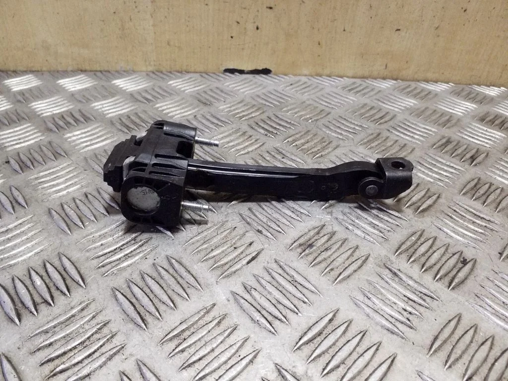 Rear door check strap stopper 31298467