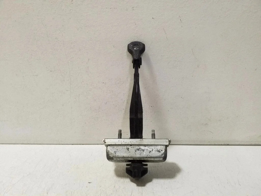 Rear door check strap stopper 20778752