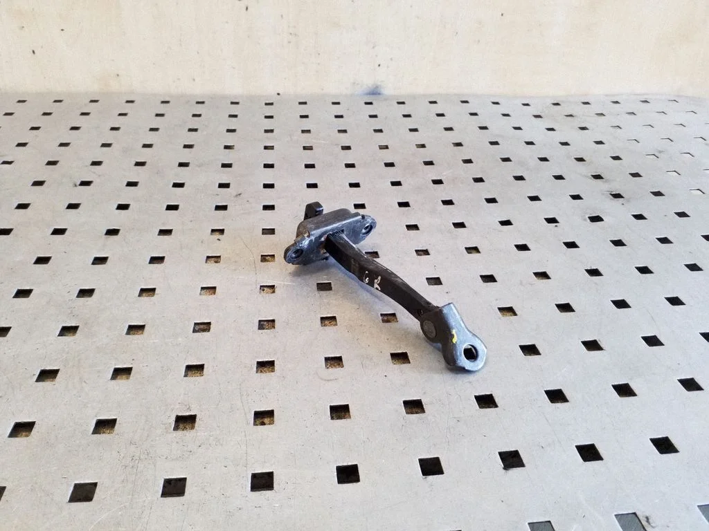 Rear door check strap stopper – right