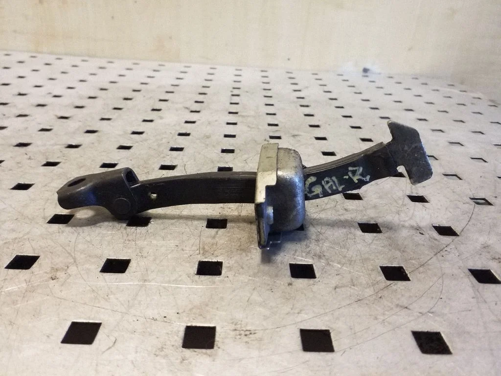 Rear door check strap stopper – Toyota RAV 4 (XA30) (2006-2016)