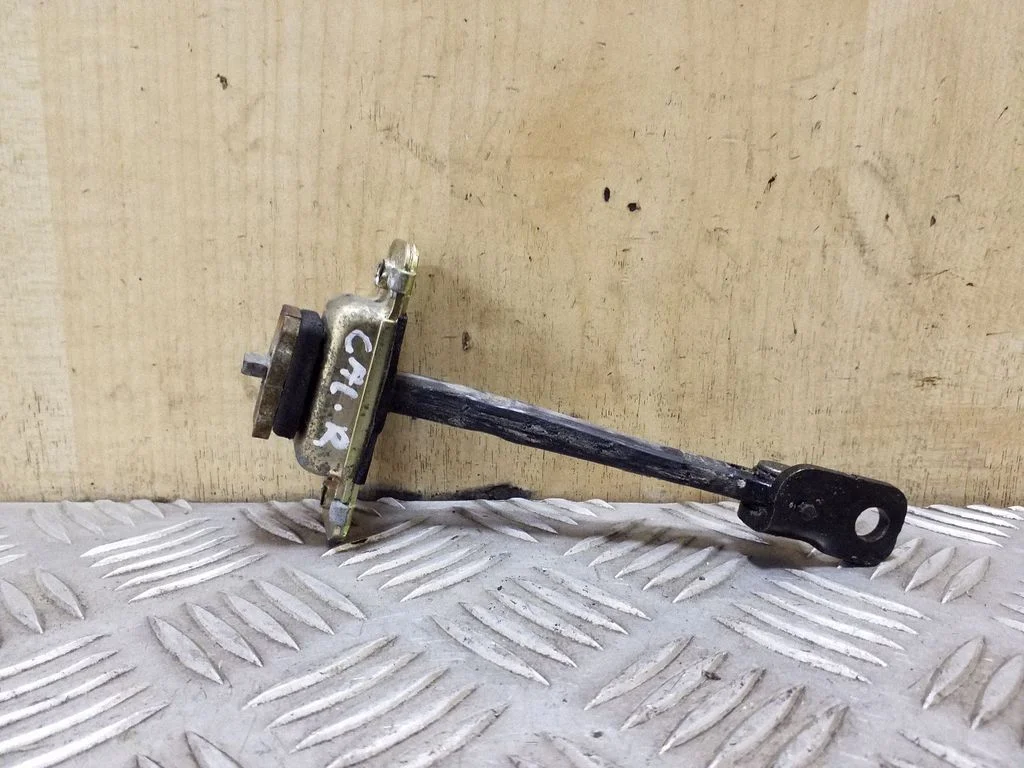 Rear door check strap stopper – right