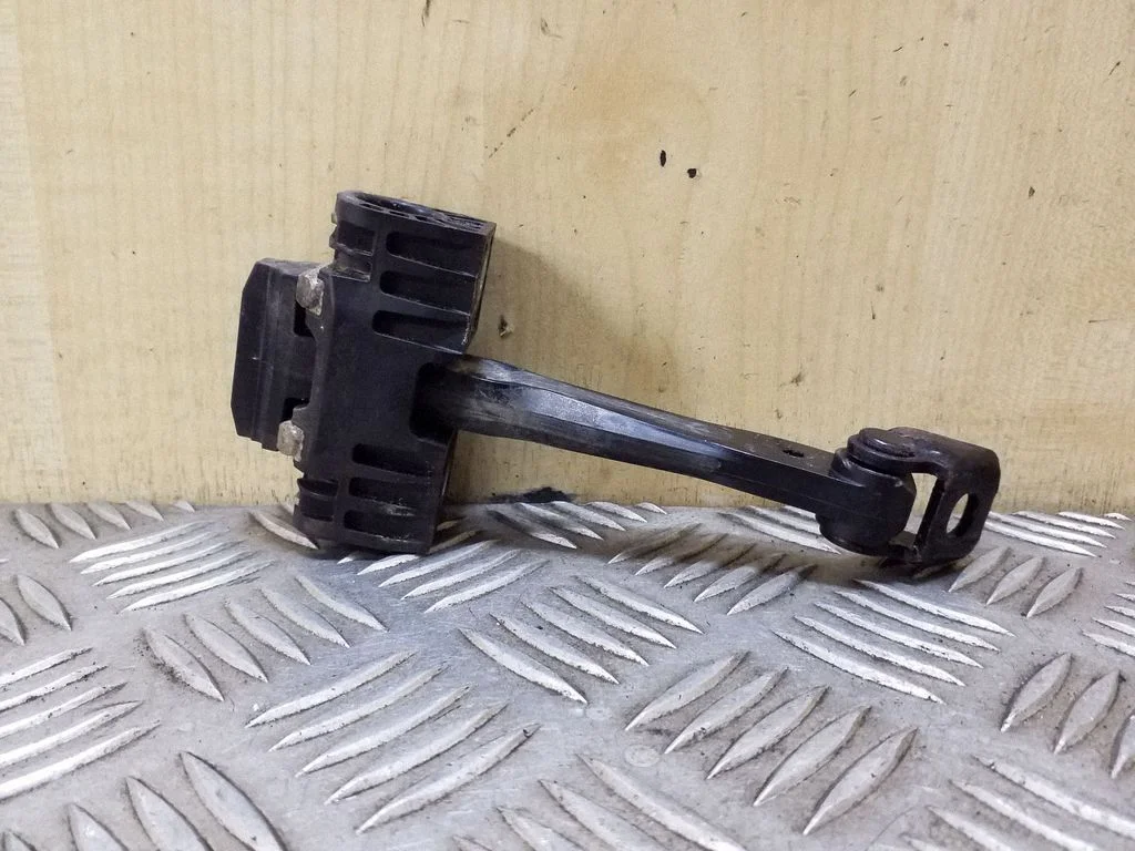 Rear door check strap stopper 7176808
