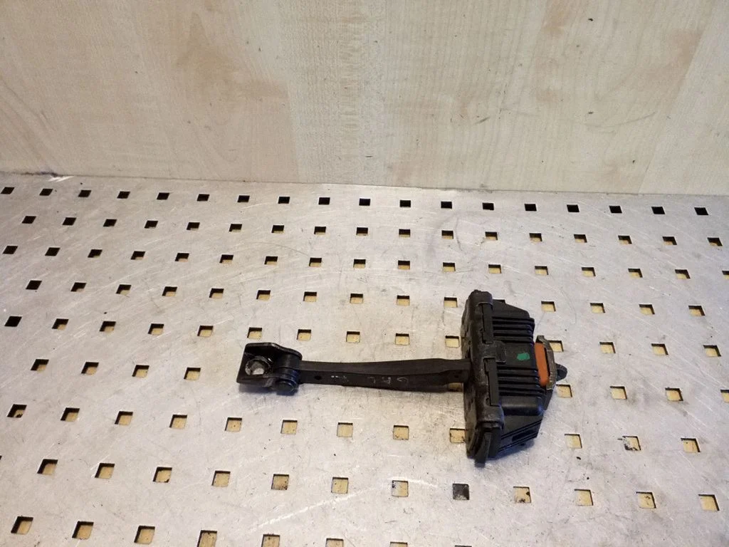 Rear door check strap stopper 7176805
