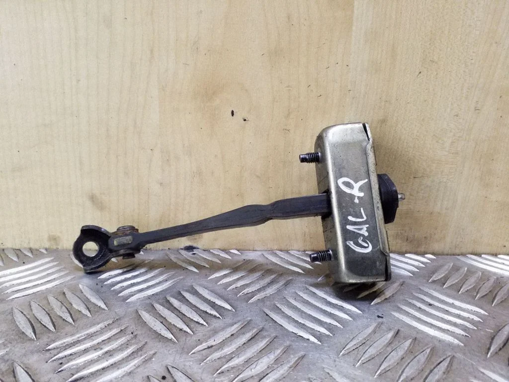 Rear door check strap stopper – right