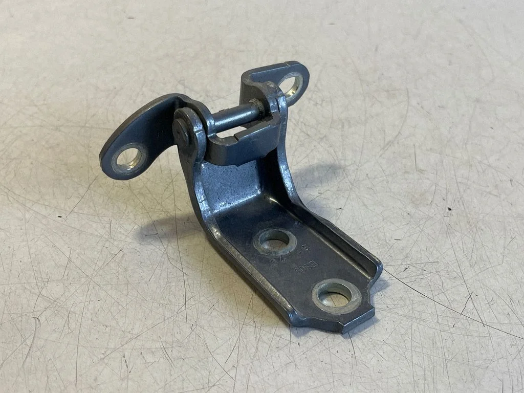 Rear door lower hinge – right