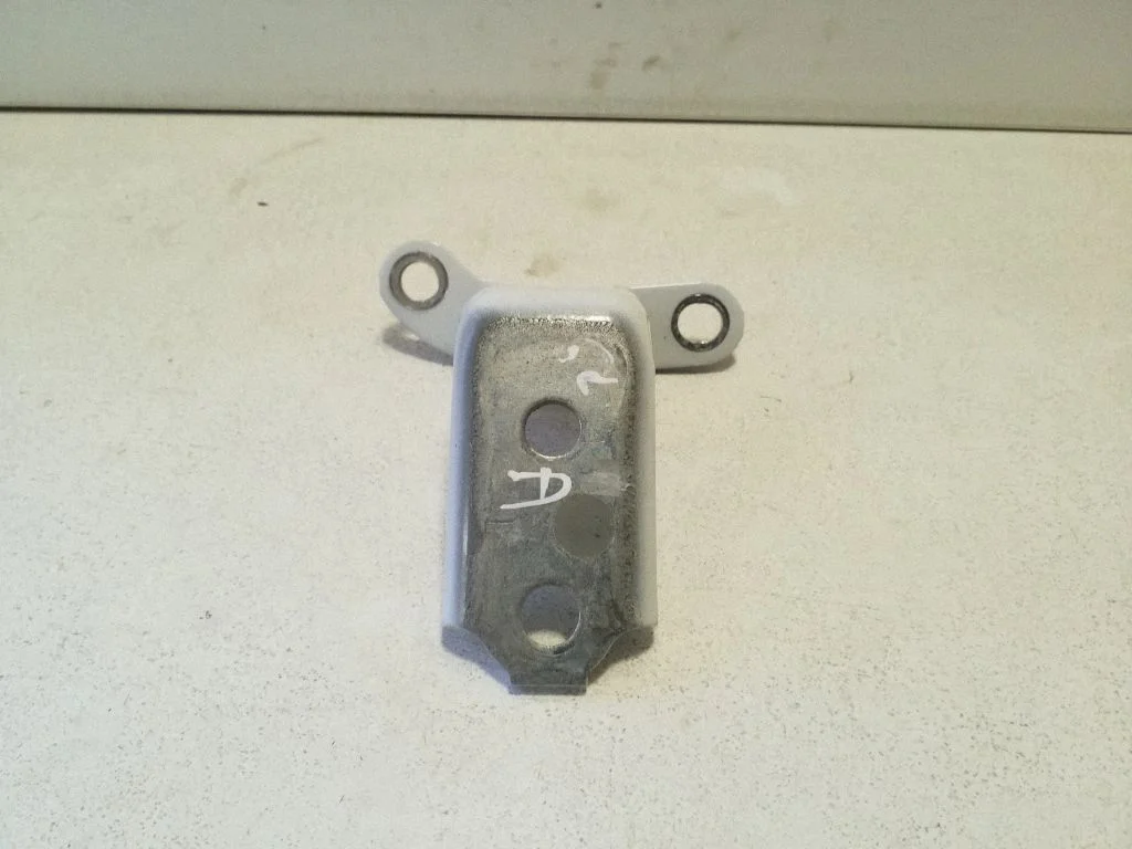 Rear door lower hinge – left