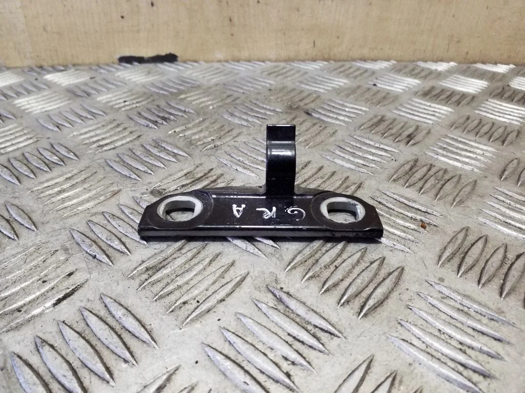 Rear door lower hinge – right