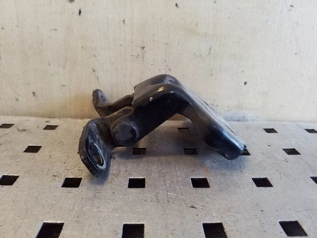 Rear door lower hinge – right