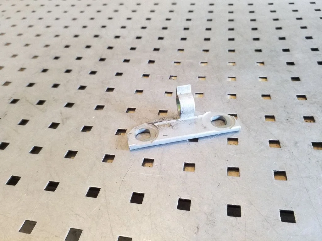 Rear door lower hinge – rear right