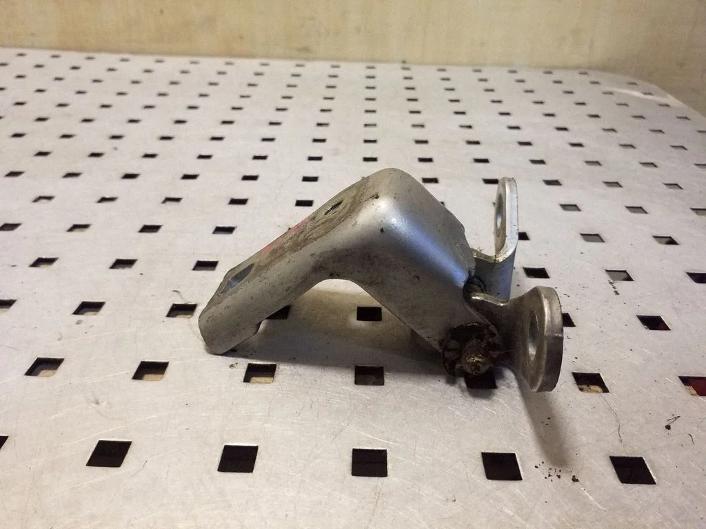 Rear door lower hinge – right