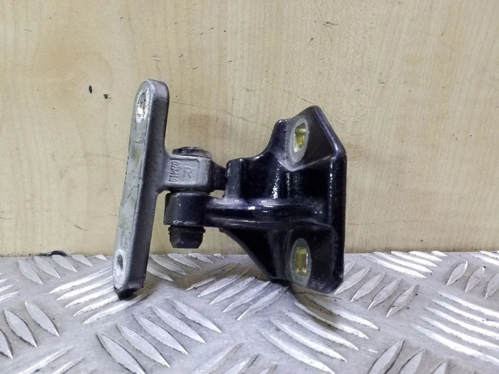 Rear door lower hinge – right