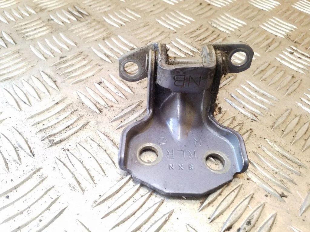Rear door lower hinge – right