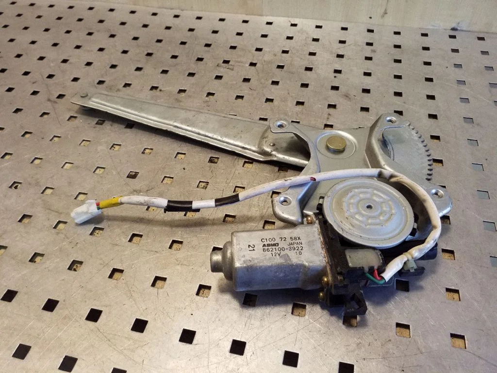 Rear door window regulator with motor