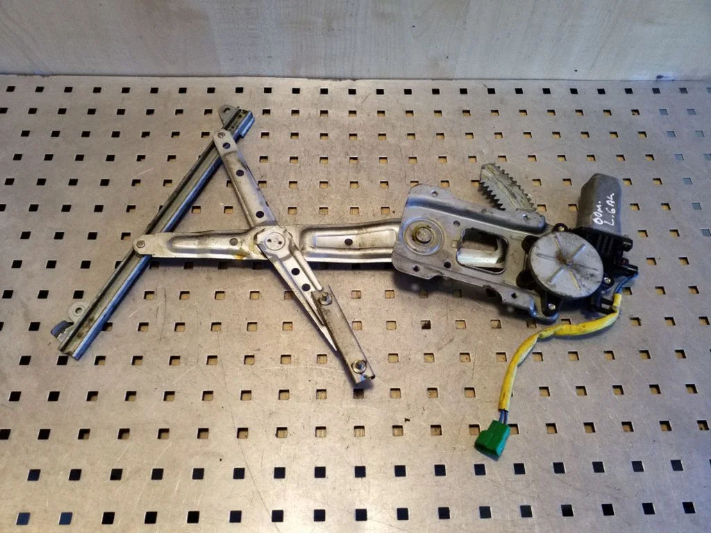 Rear door window regulator with motor – left