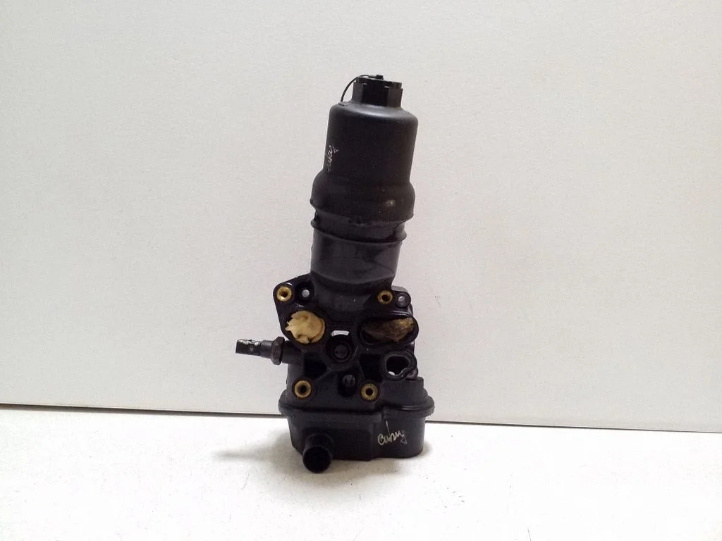 Oil filter mounting bracket 06F115397H