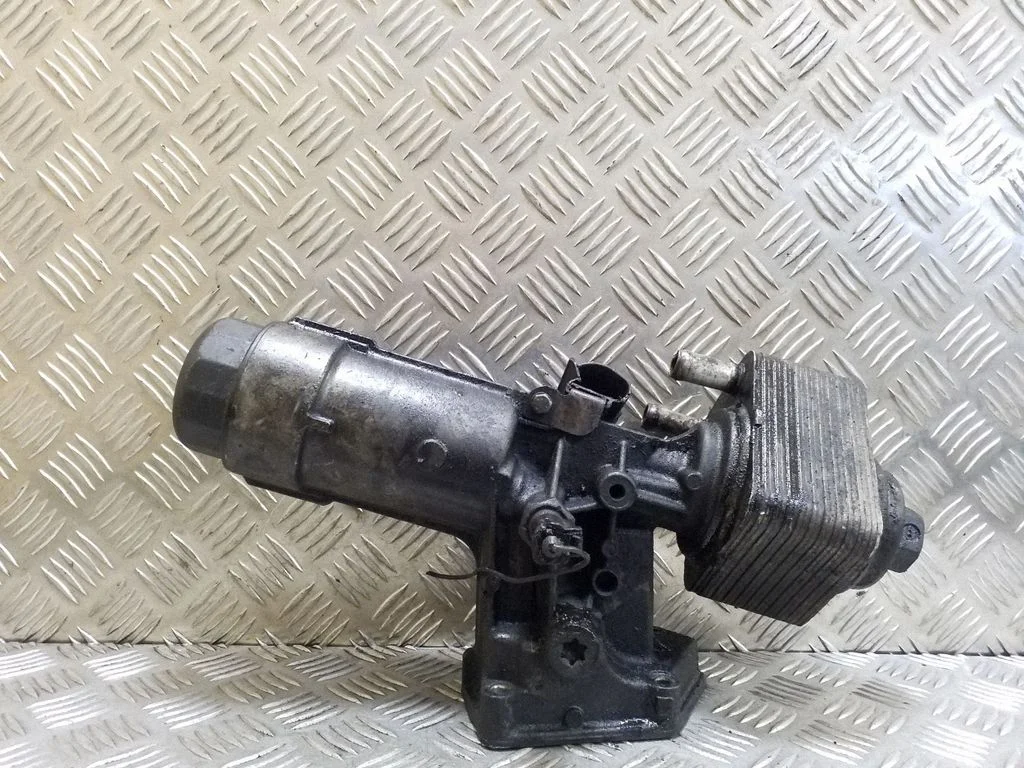Oil filter mounting bracket 038115389C