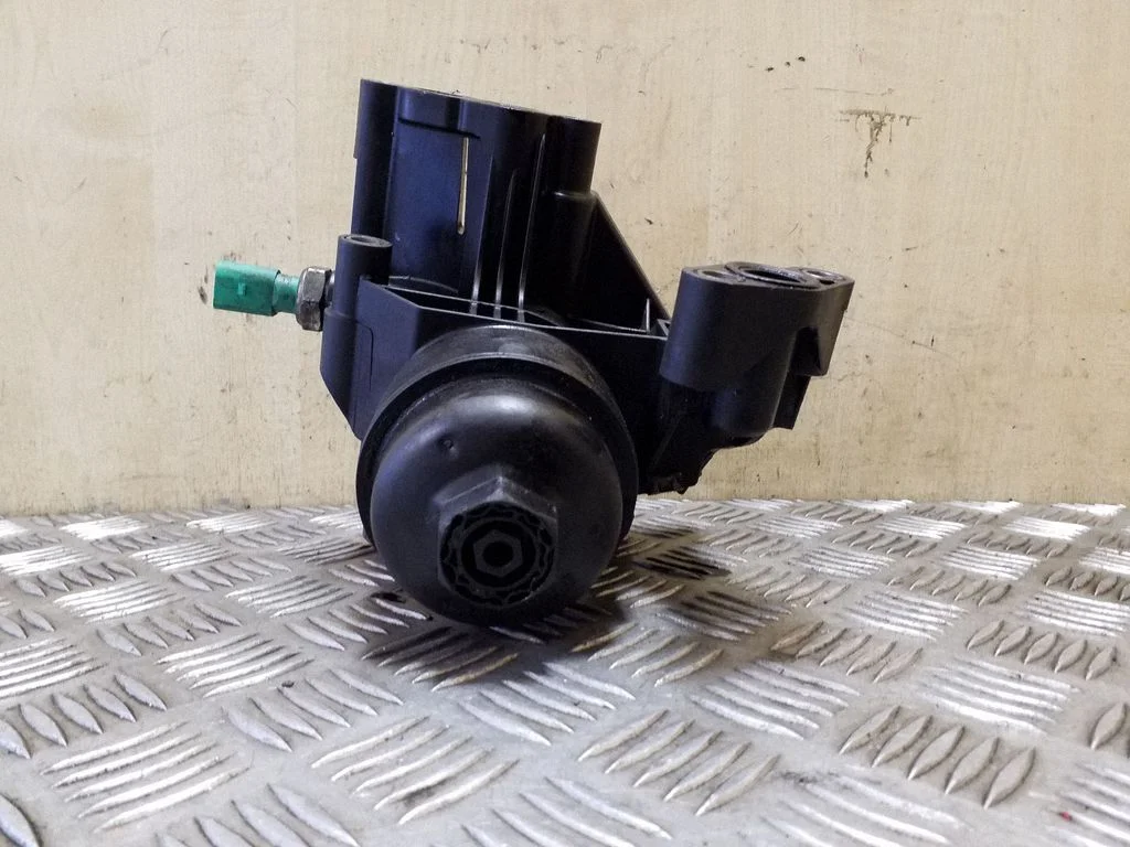 Oil filter mounting bracket 03N115389B