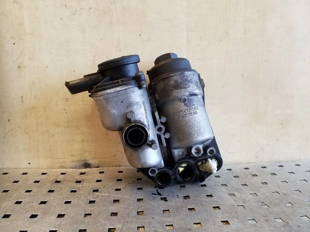 Oil filter mounting bracket 30677920