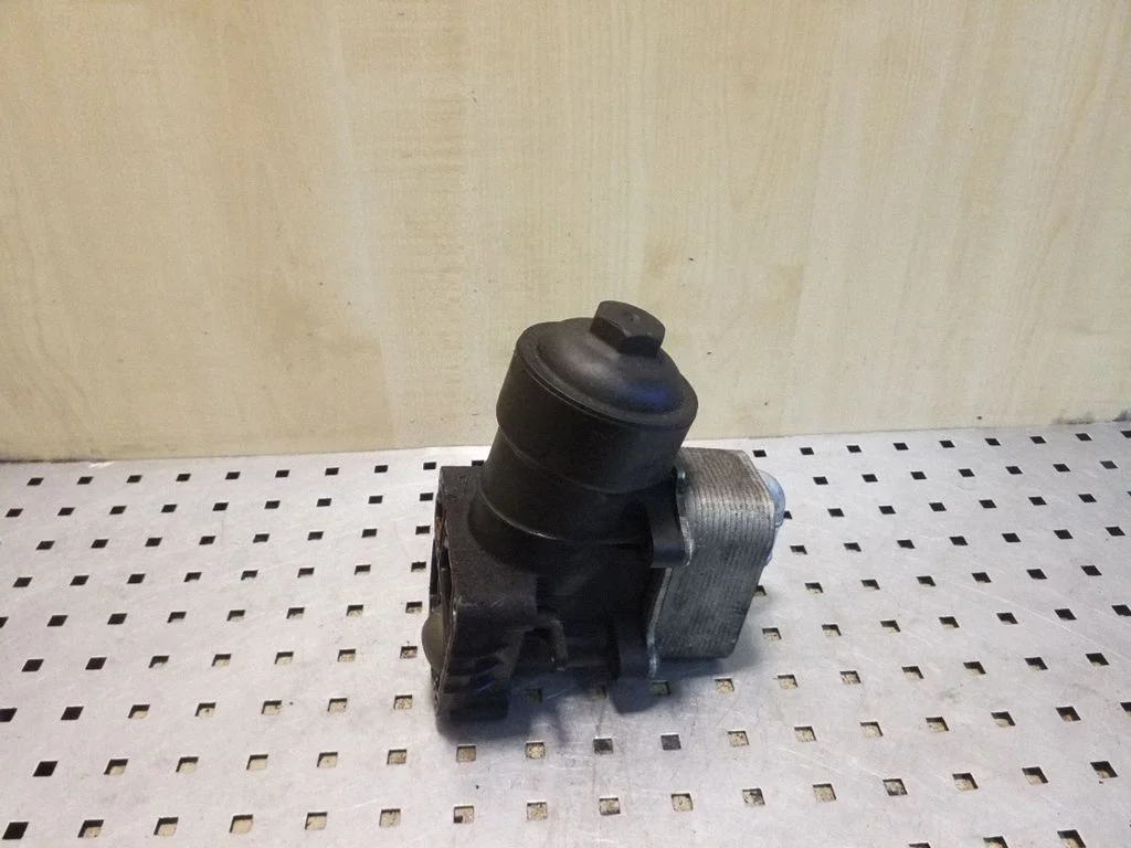 Oil filter mounting bracket 03L115389E