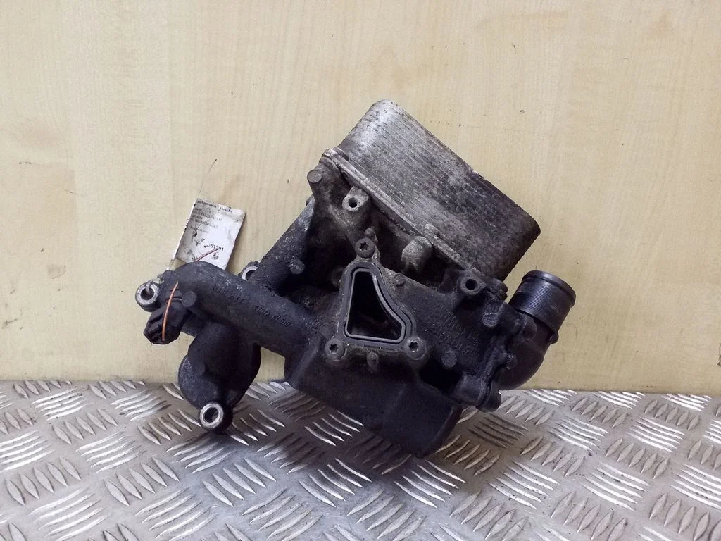 Oil filter mounting bracket