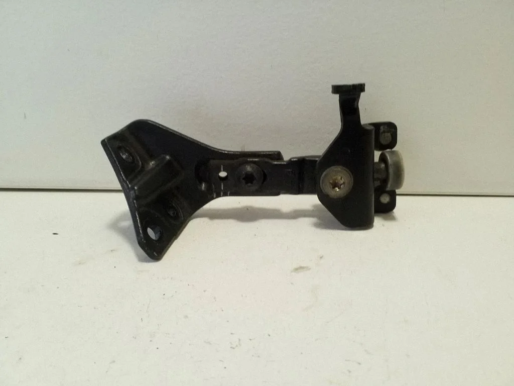Sliding door upper roller guide/hinge – left