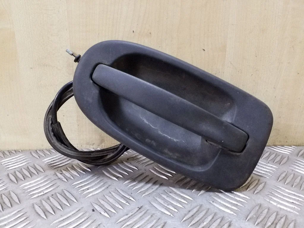 Bīdāmo durvju ārējais atvēršanas rokturis – aizmugurējā kreisā