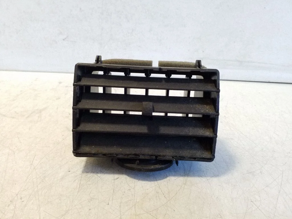 Dash center air vent grill