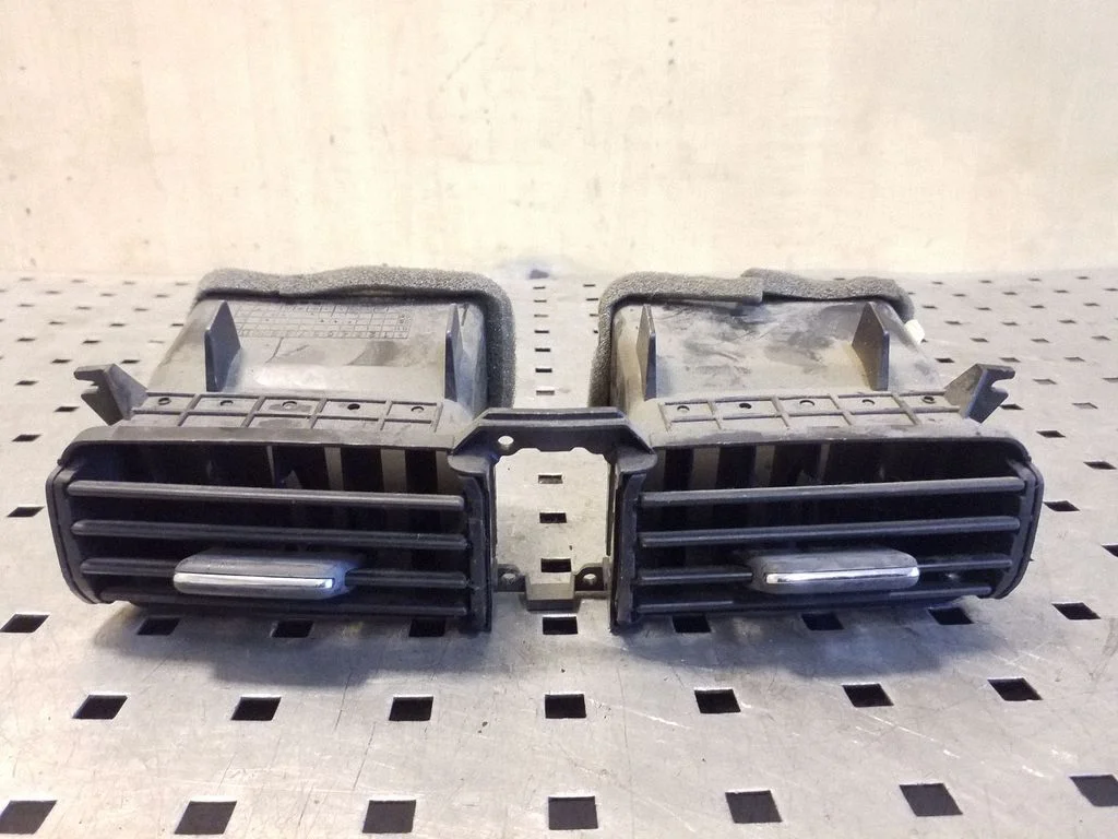 Dash center air vent grill