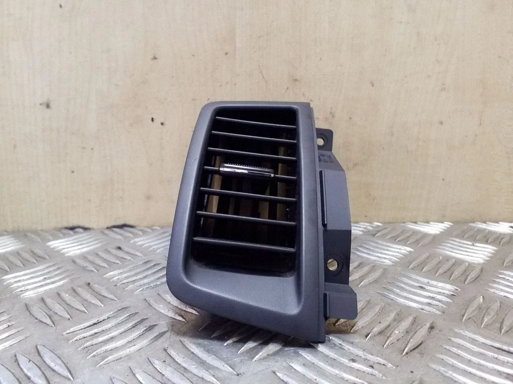 Dash center air vent grill 974102K000